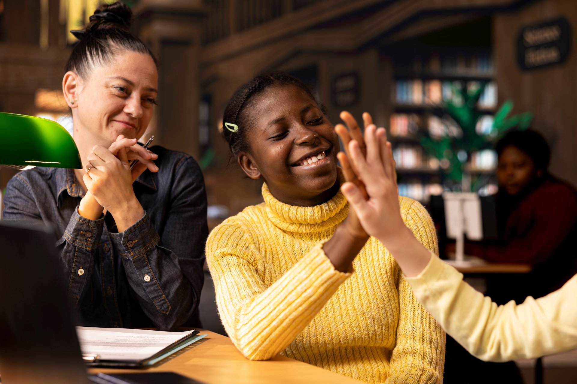 Diverse teen scholars engaged in open group conversation