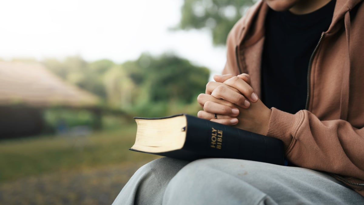 Young woman prayer confession seeking peace relationship with Jesus Christ